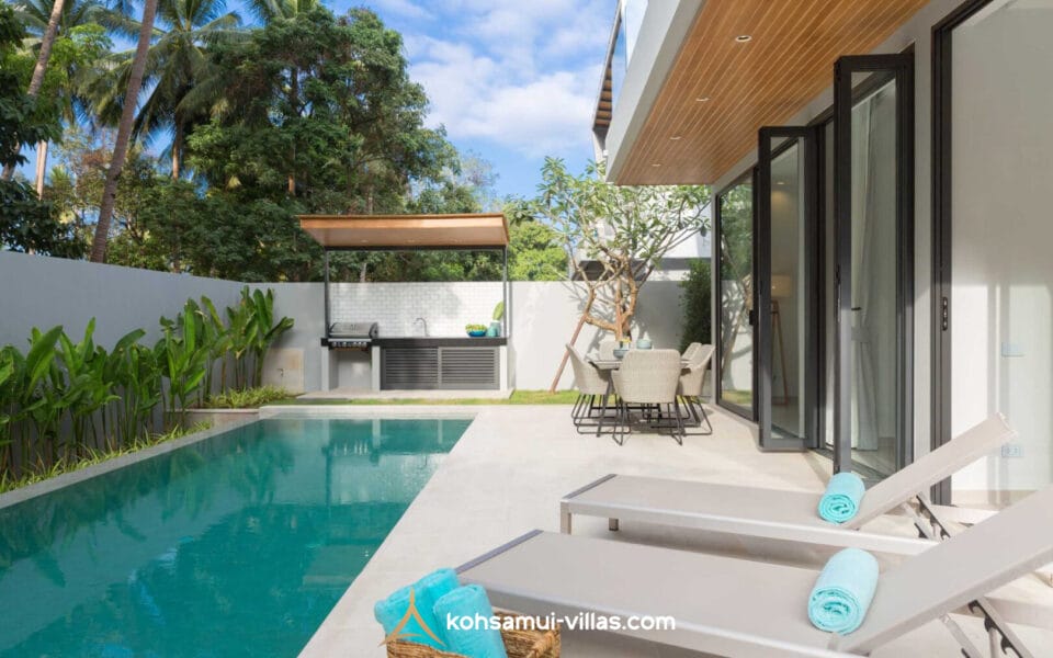 Swimming pool and outdoor lounging at Vova Village, a luxury and private estate of 3 bedroom pool villas located in Chaweng, Koh Samui, Thailand